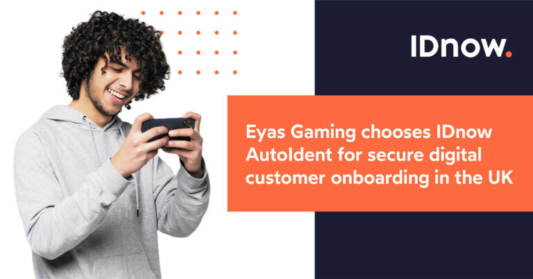 Man in gray hoodie holding his smartphone - text shows Eyas Gaming chooses IDnow AutoIdent